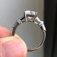 /public/photos/live/Emerald Moissanite Side Tapered Baguette Engagement Ring 780 (3).webp